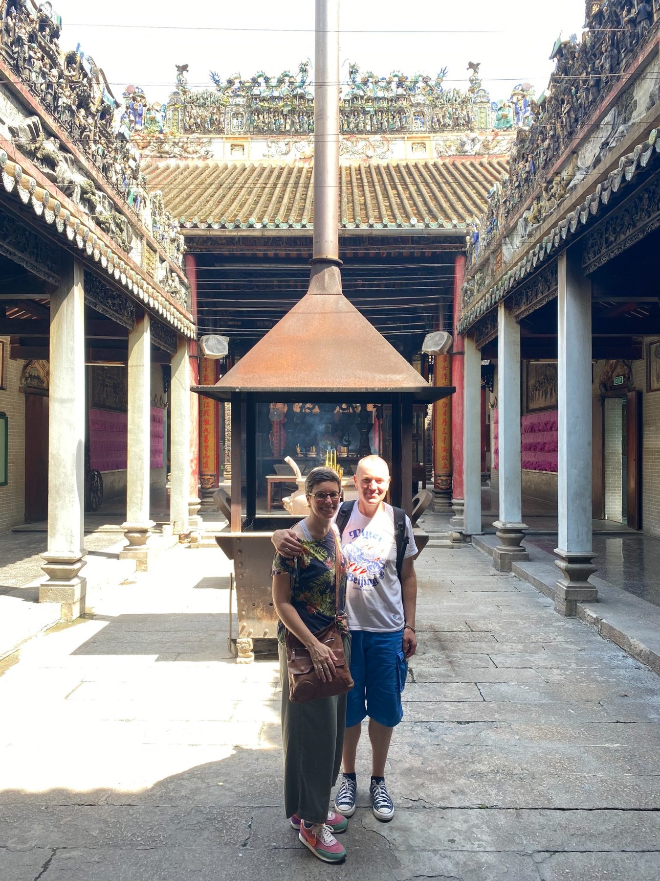 Guests inside a Chợ Lớn temple courtyard