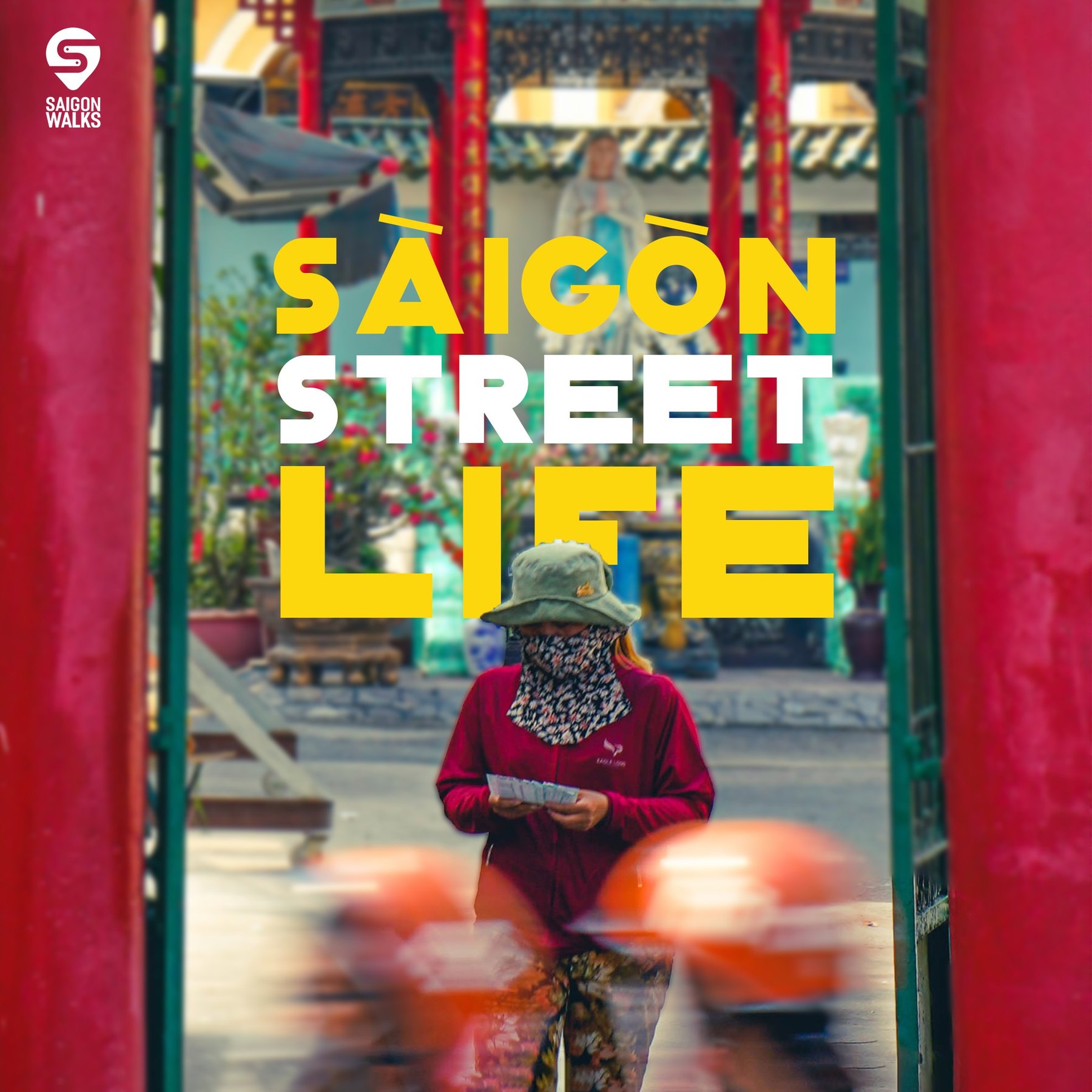 A SaigonWalks guide on a central Saigon street