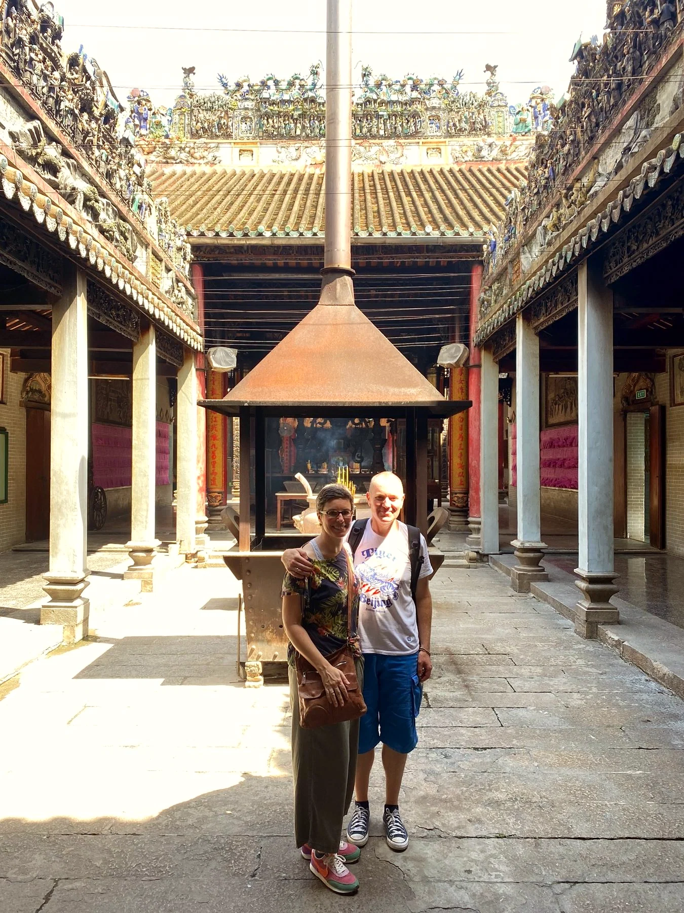 Guests inside a Chợ Lớn temple courtyard