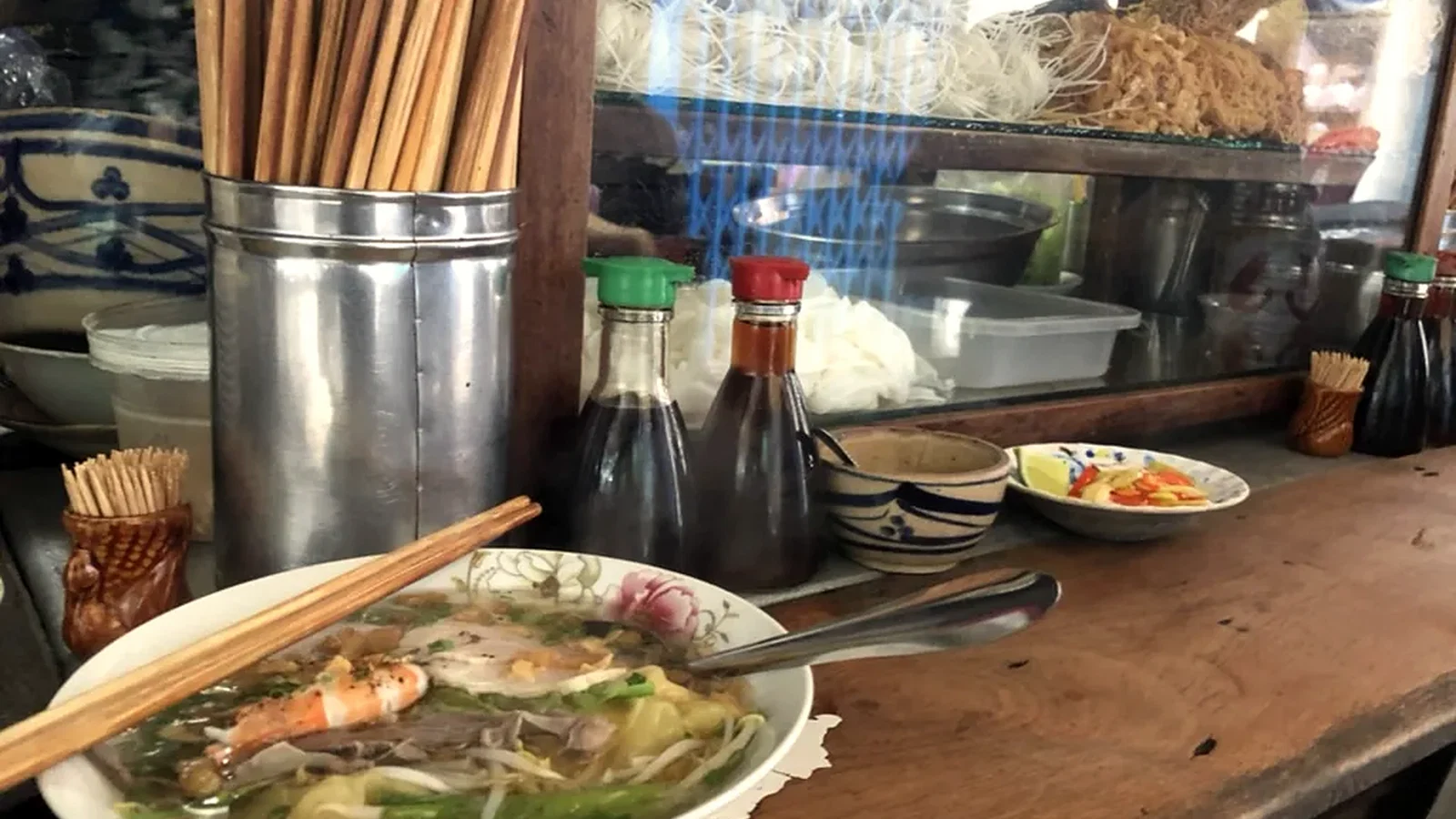 Hủ tiếu mì at a Chợ Lớn counter, where migration and breakfast culture meet.